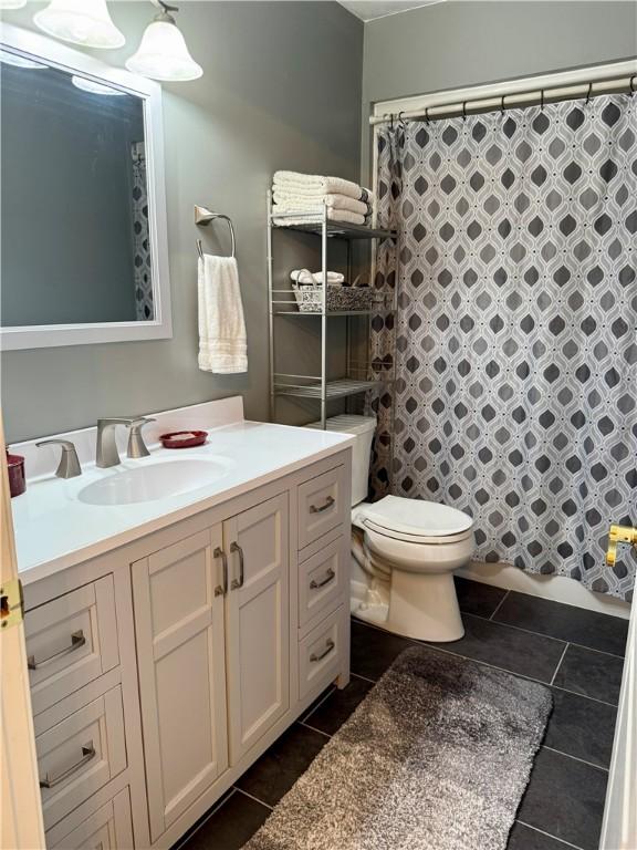 293 Sandy Hill Rd, Middlesex Twp, PA 16059 - bathroom featuring tile patterned flooring, vanity, and a shower with curtain