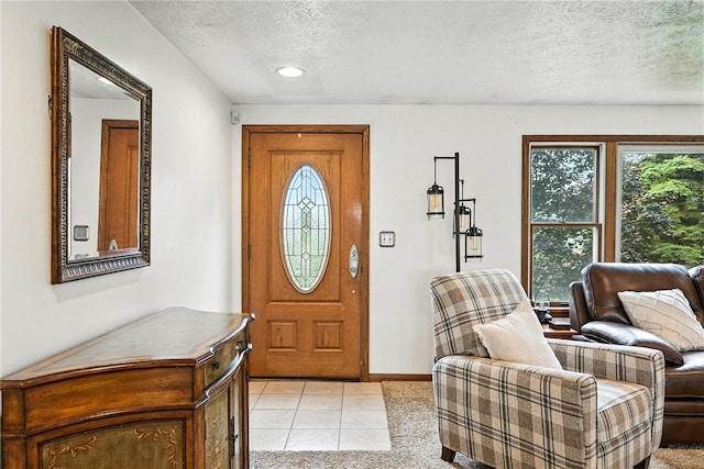 314 Shannon Cir, Daugherty Twp, PA 15066 - foyer entrance featuring a textured ceiling, plenty of natural light, light tile patterned flooring, and recessed lighting