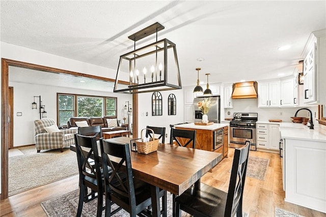 314 Shannon Cir, Daugherty Twp, PA 15066 - dining area with light wood-style flooring and recessed lighting