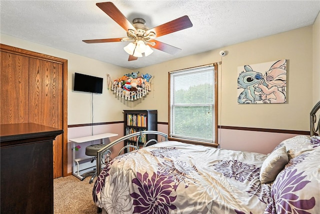 314 Shannon Cir, Daugherty Twp, PA 15066 - bedroom with carpet flooring, a ceiling fan, and a textured ceiling