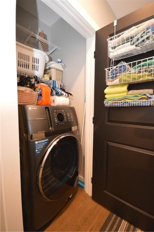 710 Cedar Ave, Central North Side, PA 15212 - laundry room featuring washer / dryer and wood finished floors