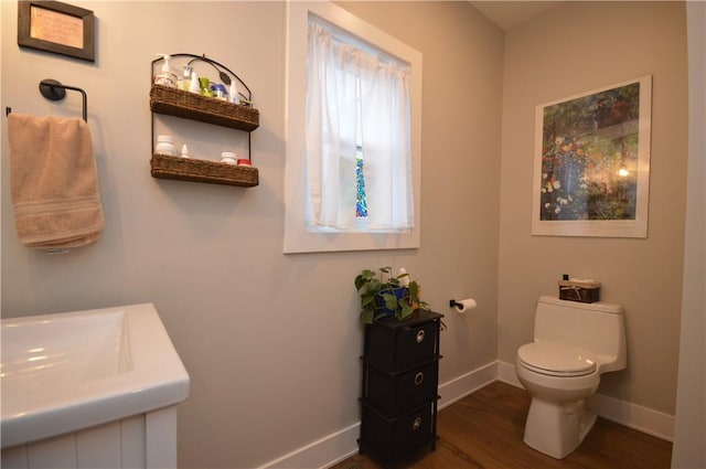 710 Cedar Ave, Central North Side, PA 15212 - bathroom with toilet and wood finished floors
