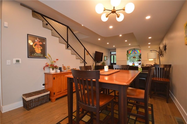 710 Cedar Ave, Central North Side, PA 15212 - dining room with a chandelier, light wood-style flooring, recessed lighting, and stairway