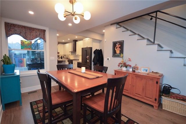 710 Cedar Ave, Central North Side, PA 15212 - dining area with wood finished floors, a chandelier, and recessed lighting