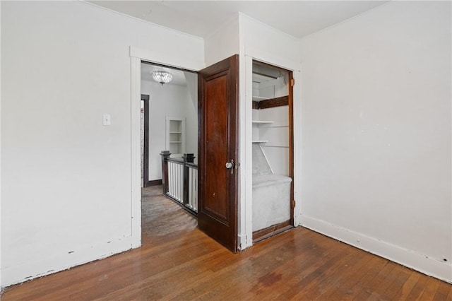 2600 Voelkel Ave, Beechview, PA 15216 - unfurnished room featuring hardwood / wood-style flooring, built in shelves, and ornamental molding