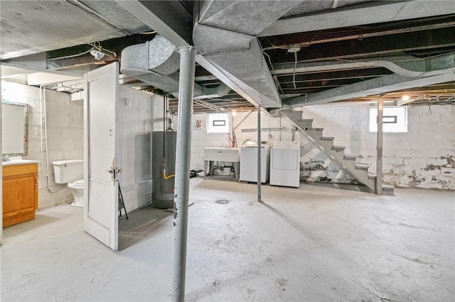 2600 Voelkel Ave, Beechview, PA 15216 - basement featuring water heater, washer and clothes dryer, and stairs