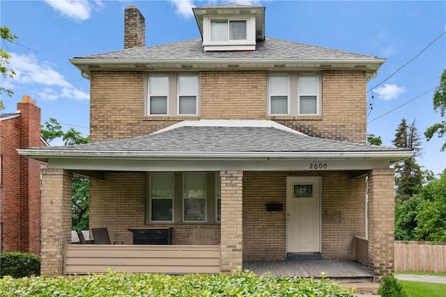 2600 Voelkel Ave, Beechview, PA 15216 - view of front of home with a porch, a shingled roof, and brick siding