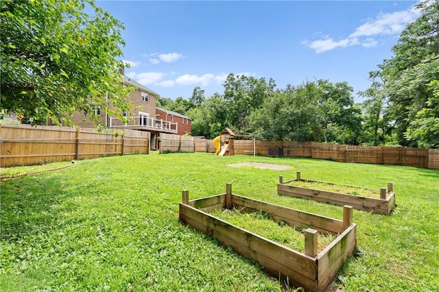2600 Voelkel Ave, Beechview, PA 15216 - fenced backyard featuring a vegetable garden and a playground