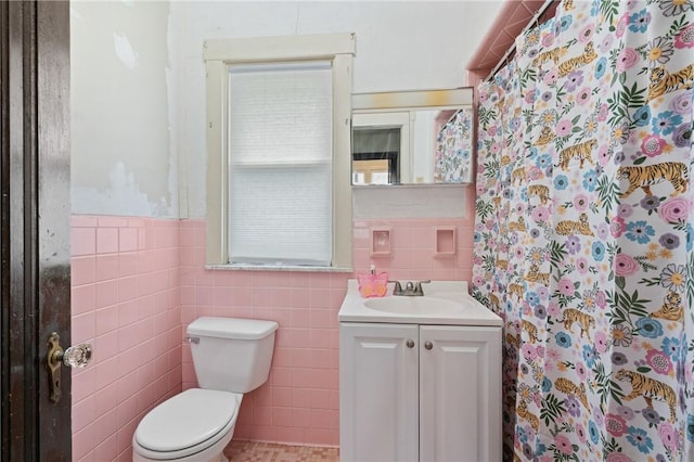 2600 Voelkel Ave, Beechview, PA 15216 - bathroom with tile walls, vanity, curtained shower, and wainscoting