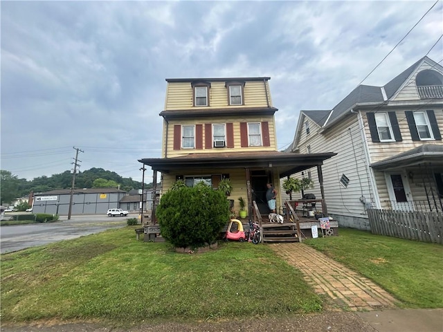 822 4th St, West Elizabeth, PA 15088 - view of front of home featuring covered porch and a front yard