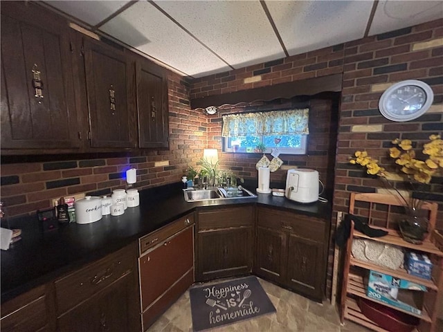 822 4th St, West Elizabeth, PA 15088 - kitchen with dark brown cabinetry, dark countertops, dishwashing machine, and a drop ceiling