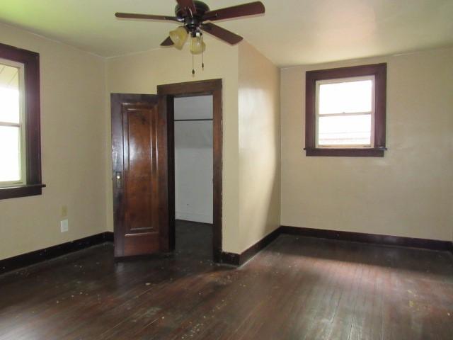 409 Keystone Dr, New Kensington, PA 15068 - unfurnished room with hardwood / wood-style floors, ceiling fan, and lofted ceiling