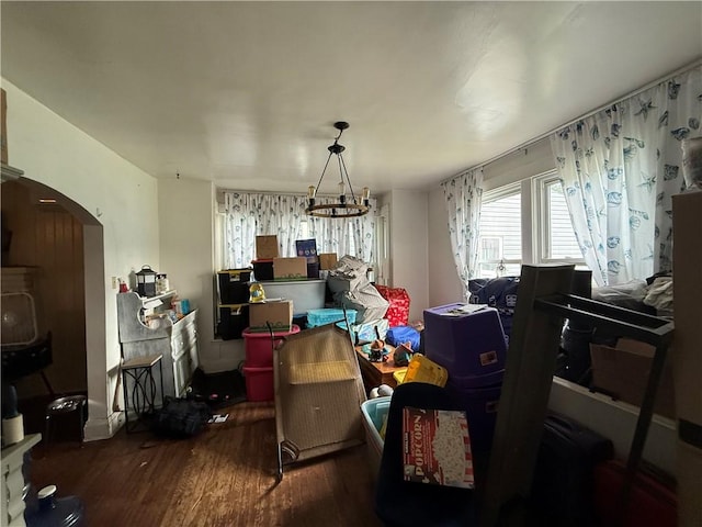 431 New York Ave, Rochester Twp, PA 15074 - dining space with arched walkways, wood finished floors, and a chandelier