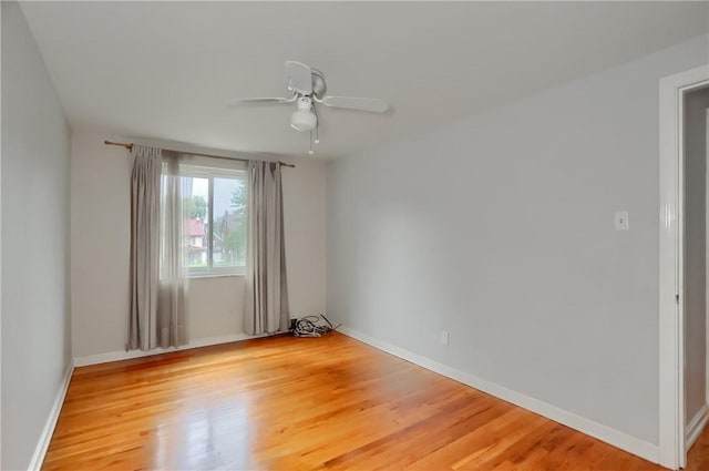 7034 Penn Ave, Point Breeze, PA 15208 - empty room with light wood-type flooring and a ceiling fan
