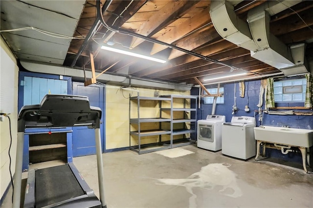 7034 Penn Ave, Point Breeze, PA 15208 - unfinished below grade area with washer and dryer and a sink