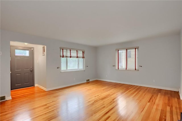 7034 Penn Ave, Point Breeze, PA 15208 - unfurnished living room with plenty of natural light and light wood-style flooring