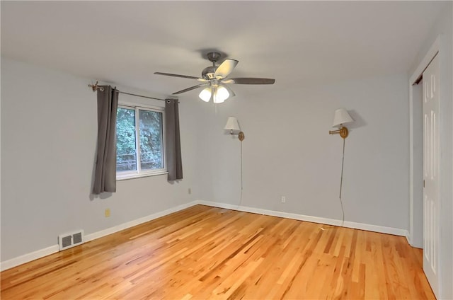 7034 Penn Ave, Point Breeze, PA 15208 - unfurnished bedroom featuring light wood-type flooring, a ceiling fan, and a closet