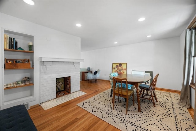 1229 Richmond St, Regent Square, PA 15218 - dining room featuring light wood-type flooring, a fireplace, and recessed lighting