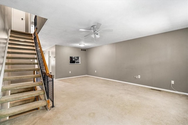 651 Newton Sq, Moon/Crescent Twp, PA 15108 - below grade area featuring a ceiling fan, light colored carpet, and stairway
