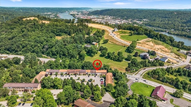 651 Newton Sq, Moon/Crescent Twp, PA 15108 - view of property location featuring a large body of water and a heavily wooded area