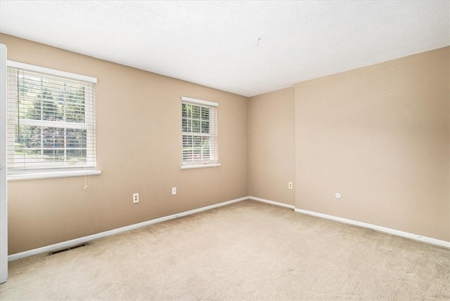 651 Newton Sq, Moon/Crescent Twp, PA 15108 - empty room with carpet floors and healthy amount of natural light