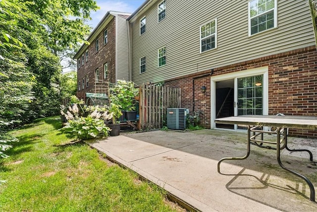 651 Newton Sq, Moon/Crescent Twp, PA 15108 - back of house featuring a patio, brick siding, and a yard