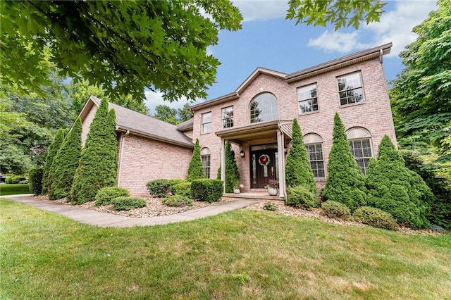 1044 Cross Creek Dr, South Union Twp, PA 15401 - view of front facade with brick siding and a front yard