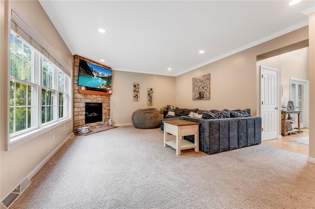 1044 Cross Creek Dr, South Union Twp, PA 15401 - living room featuring crown molding, plenty of natural light, carpet, recessed lighting, and a fireplace