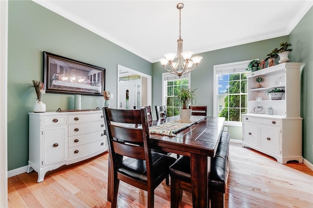 1044 Cross Creek Dr, South Union Twp, PA 15401 - dining room with a chandelier, light wood-style flooring, and ornamental molding