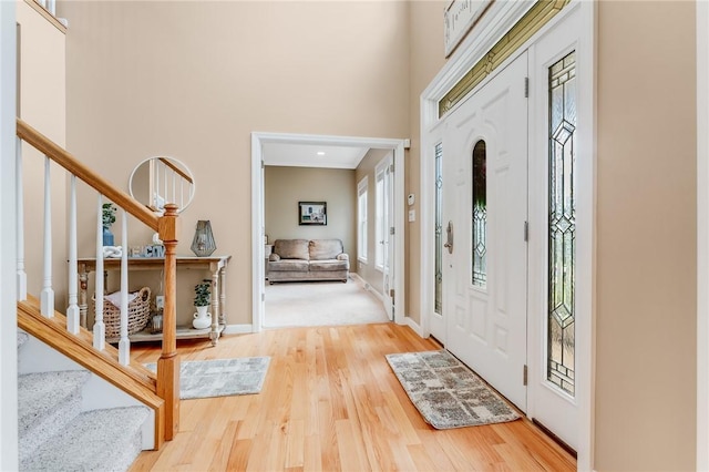 1044 Cross Creek Dr, South Union Twp, PA 15401 - entryway featuring stairway, wood finished floors, and a high ceiling
