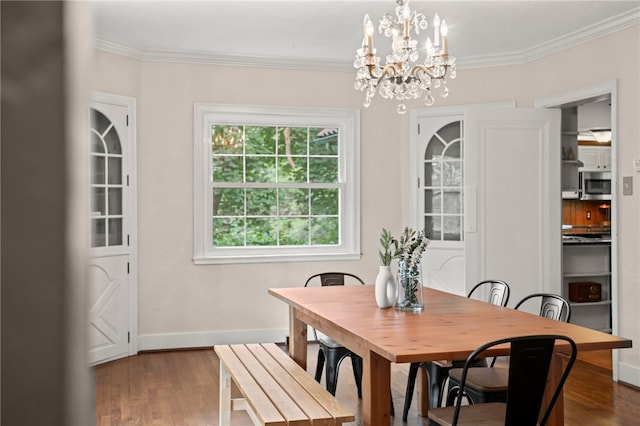 1302 Mount Royal Blvd, Shaler, PA 15223 - dining space featuring ornamental molding, dark wood-type flooring, and a chandelier