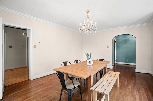 1302 Mount Royal Blvd, Shaler, PA 15223 - dining space featuring a chandelier, dark wood-type flooring, ornamental molding, and arched walkways