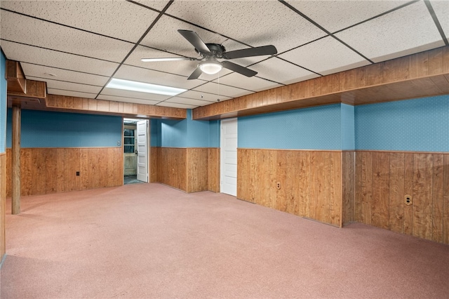 1302 Mount Royal Blvd, Shaler, PA 15223 - finished basement with wainscoting, a drop ceiling, carpet floors, wood walls, and ceiling fan