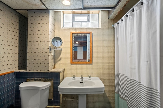 1302 Mount Royal Blvd, Shaler, PA 15223 - bathroom featuring tile walls and a shower with curtain