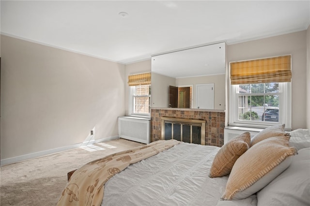 1302 Mount Royal Blvd, Shaler, PA 15223 - carpeted bedroom with radiator heating unit, crown molding, and a glass covered fireplace