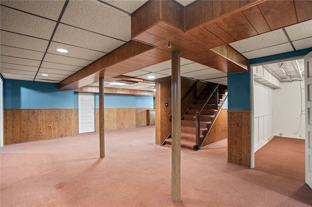 1302 Mount Royal Blvd, Shaler, PA 15223 - finished below grade area featuring a drop ceiling, a wainscoted wall, carpet, stairs, and wooden walls