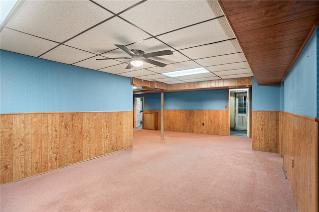 1302 Mount Royal Blvd, Shaler, PA 15223 - finished below grade area with a wainscoted wall, a drop ceiling, wood walls, carpet, and a ceiling fan