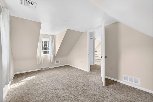 112 Oxford Pl, Saint Clair, PA 15241 - additional living space featuring carpet flooring and vaulted ceiling