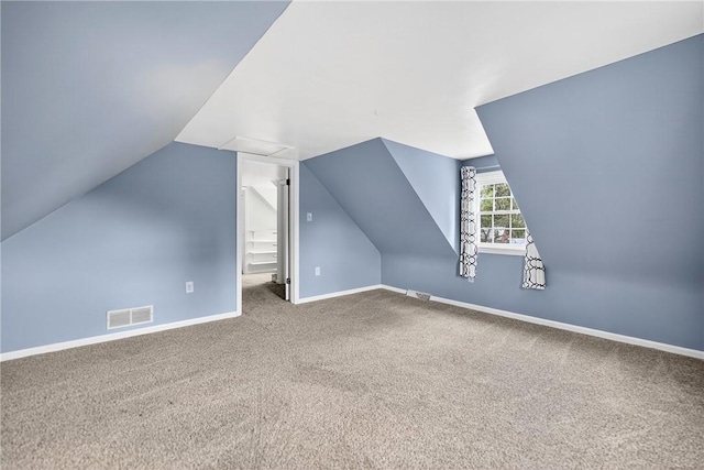 112 Oxford Pl, Saint Clair, PA 15241 - additional living space with carpet floors and vaulted ceiling