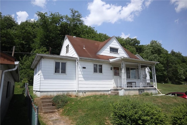 721 Spring St, Roscoe, PA 15477 - bungalow-style home featuring a porch and a front lawn