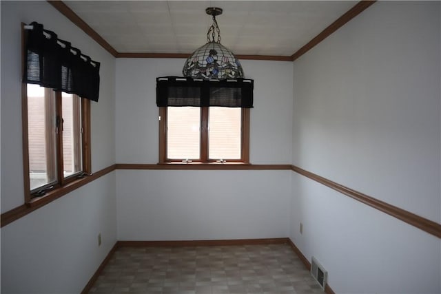 721 Spring St, Roscoe, PA 15477 - empty room featuring tile patterned floors and ornamental molding