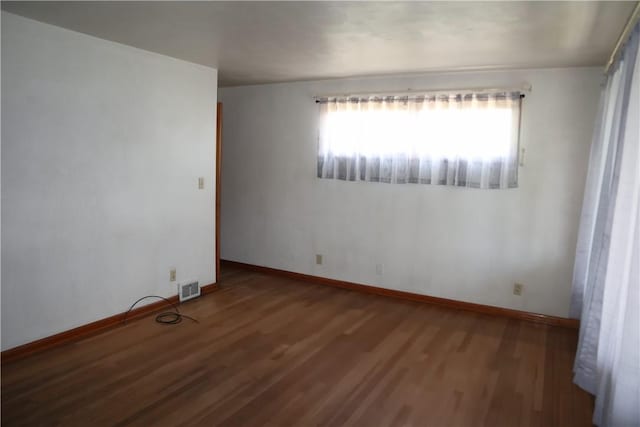 721 Spring St, Roscoe, PA 15477 - spare room featuring wood finished floors and baseboards