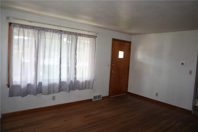 721 Spring St, Roscoe, PA 15477 - entrance foyer with wood finished floors and baseboards