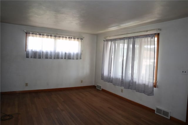 721 Spring St, Roscoe, PA 15477 - empty room featuring baseboards and wood finished floors