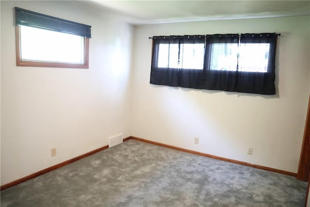 721 Spring St, Roscoe, PA 15477 - carpeted empty room with baseboards