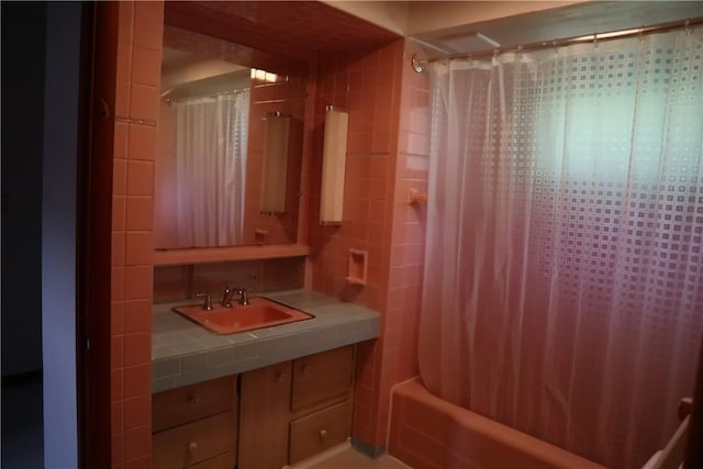 721 Spring St, Roscoe, PA 15477 - full bathroom featuring vanity, shower / bath combo, and tile walls