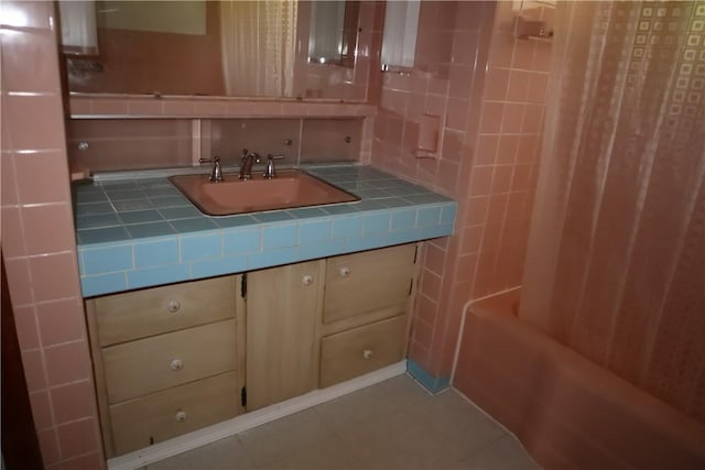 721 Spring St, Roscoe, PA 15477 - bathroom featuring vanity, shower / bath combination with curtain, and tile patterned floors