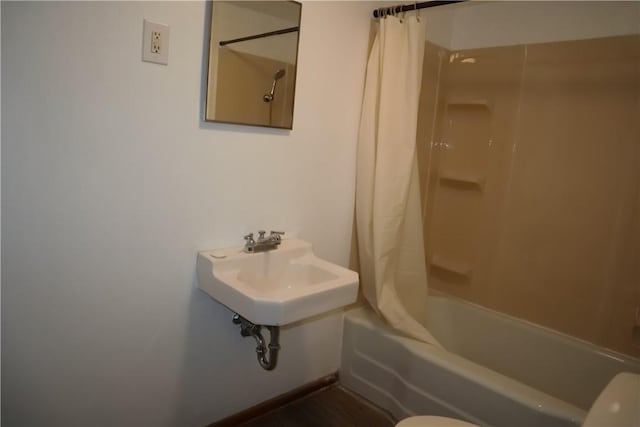 721 Spring St, Roscoe, PA 15477 - bathroom with shower / tub combo and a sink