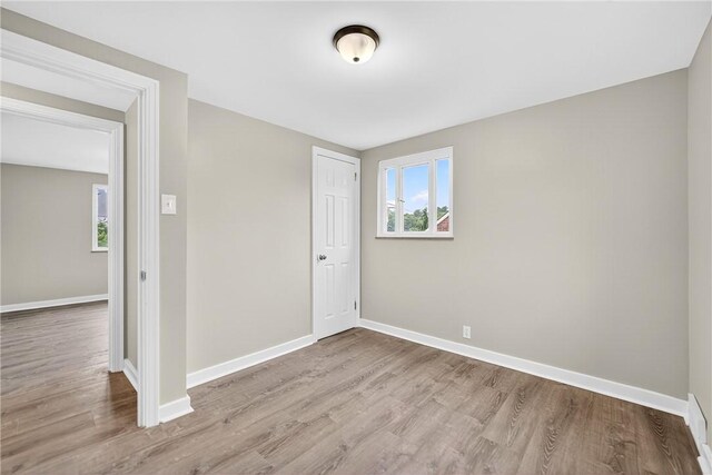 88 Pennsylvania Blvd, Monessen, PA 15062 - empty room featuring wood finished floors and baseboards