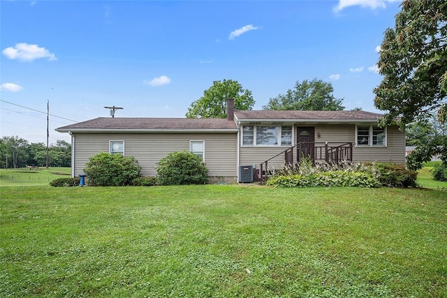 115 Shippingport Rd, Aliquippa, PA 15001 - rear view of house featuring a lawn and a chimney